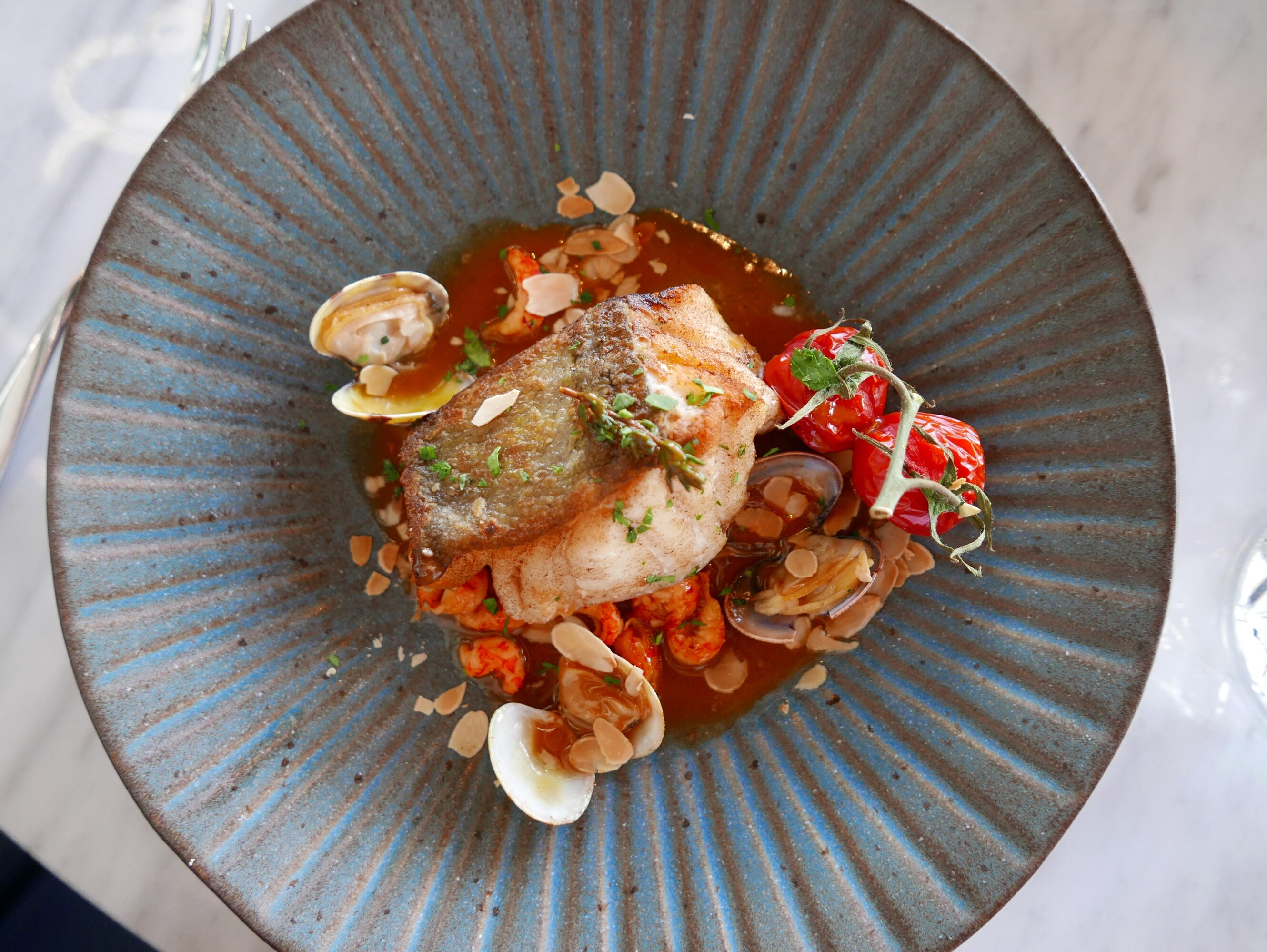 Voordelig 3-gangenmenu met OVMiles bij Langoest: Vis aan de Maas