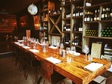 Bistro Zino_interieur_tafel_wijnkast_de Buik Rotterdam.jpg