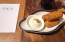 Sinck aan de bar - de Buik van Amsterdam.jpg